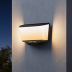 eufy Wall Light Cam S4 illuminated on a wall in warm light, official product creative