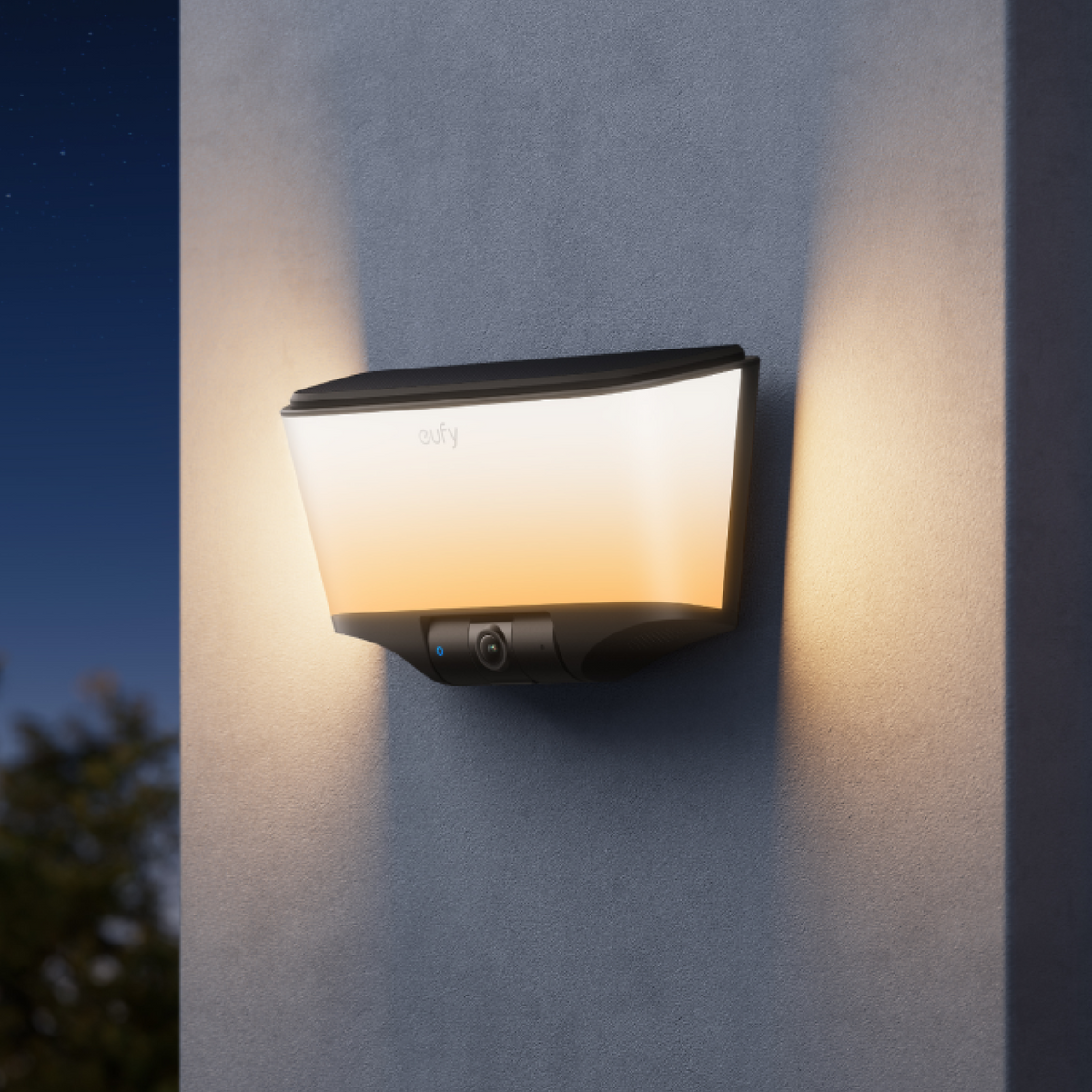 eufy Wall Light Cam S4 illuminated on a wall in warm light, official product creative