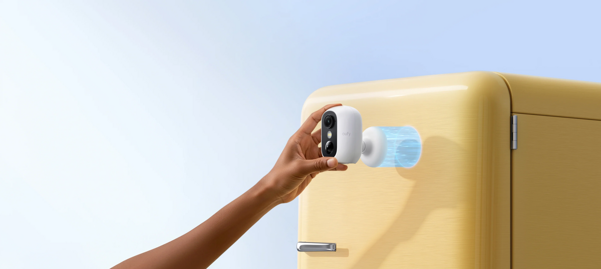White eufyCam C35 magnetic mounting illustration on a refrigerator; manufacturer reference image for renewed stock
