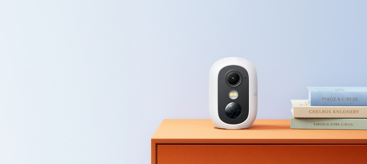 White eufyCam C35 placed on an indoor shelf; manufacturer placement illustration