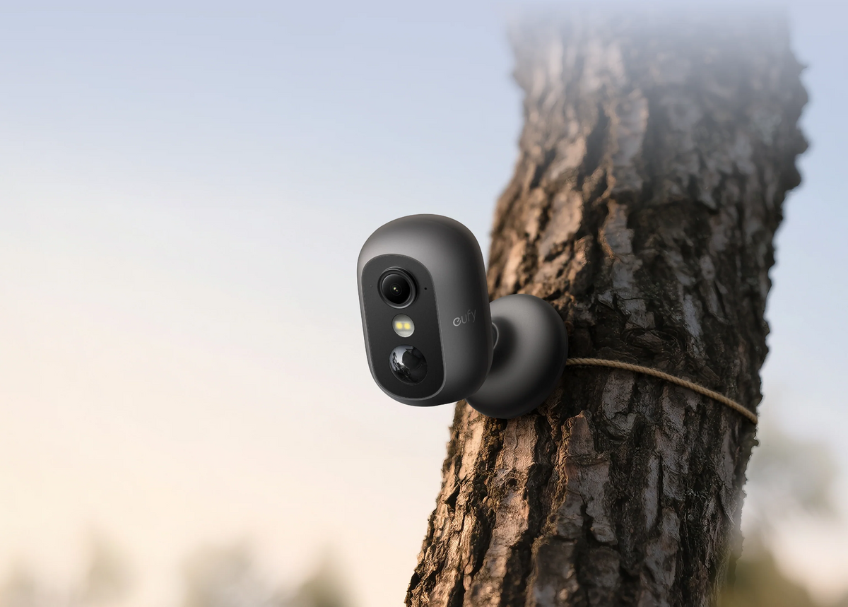 Black eufyCam C35 tree-mounting example; mounting illustration only, this listing is white