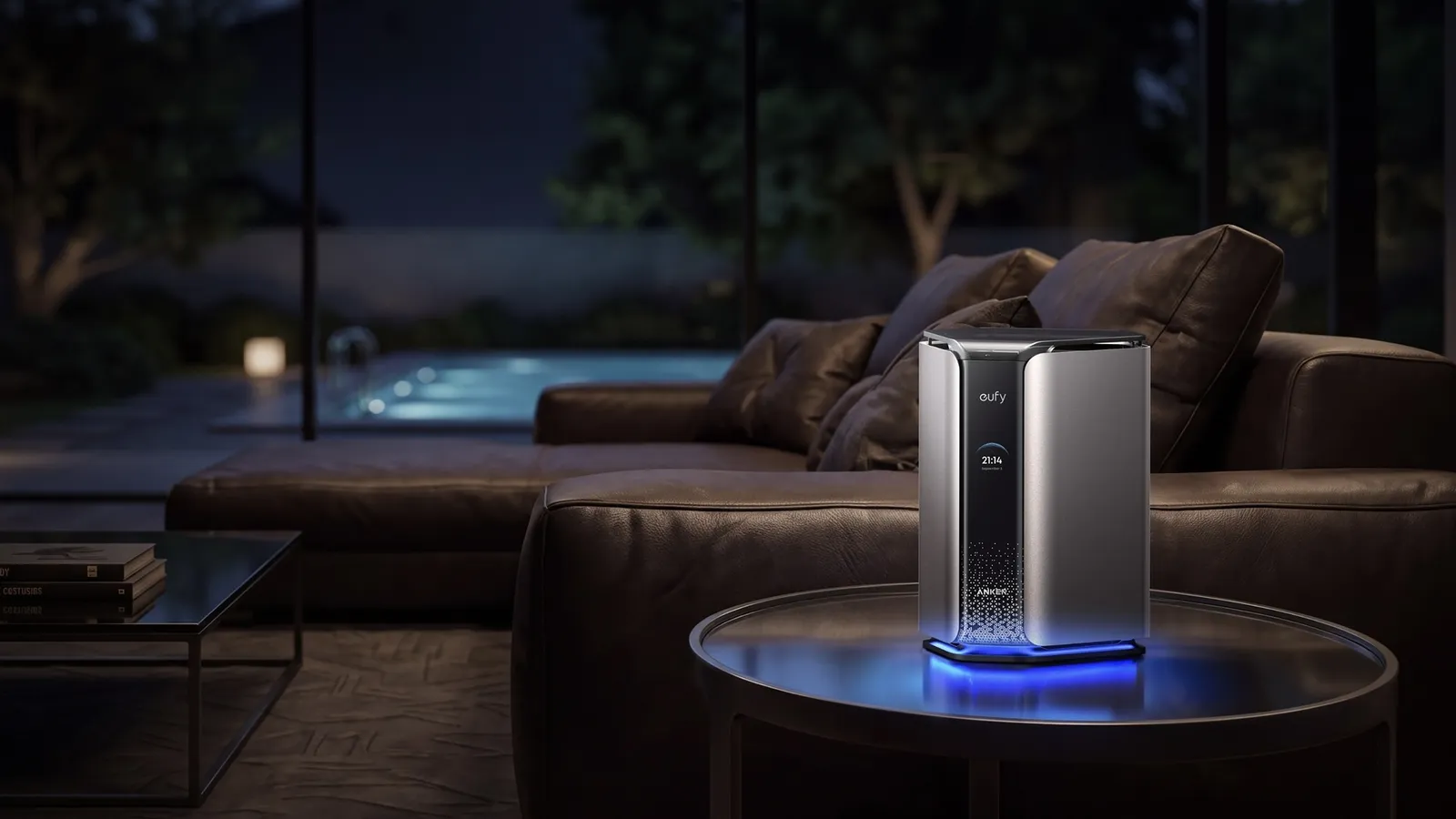 Anker MindBase on a glass table in a living room at dusk